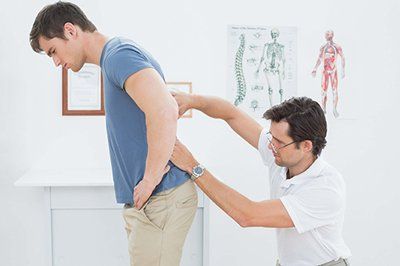Chiropractor and Patient — Chiropractic Care, Chiropractic Adjustment in Danville, VA