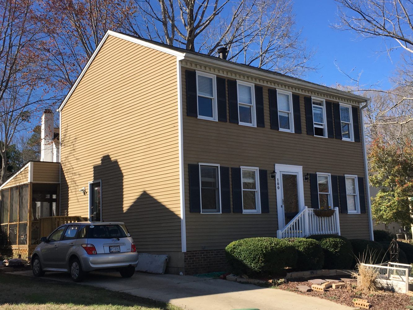 Beautiful Home Exterior with Sunroom