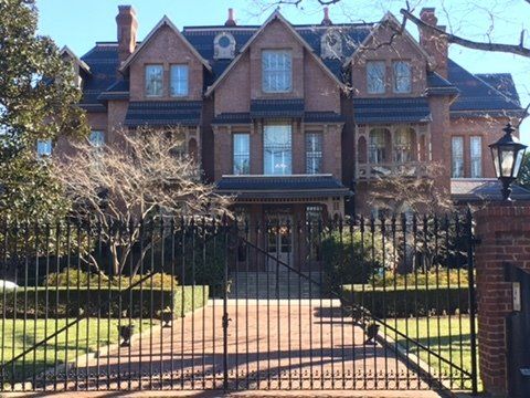 Gated home with beautiful brick exterior