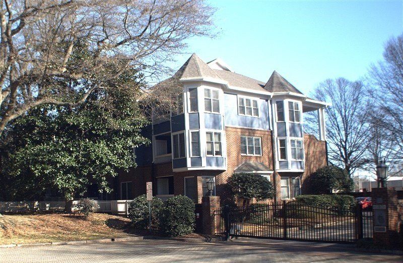 Blue House with Brick Exterior