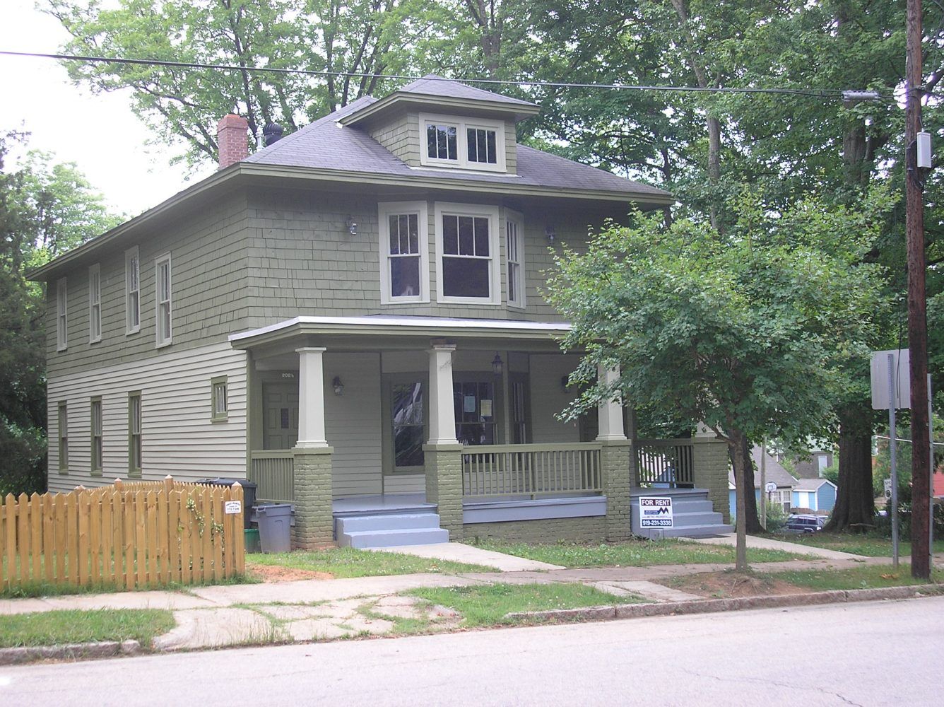 Green and White Home For Rent