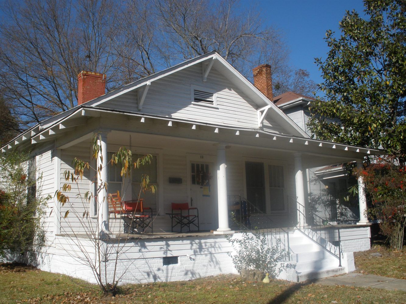 White Exterior Home with Large Porch