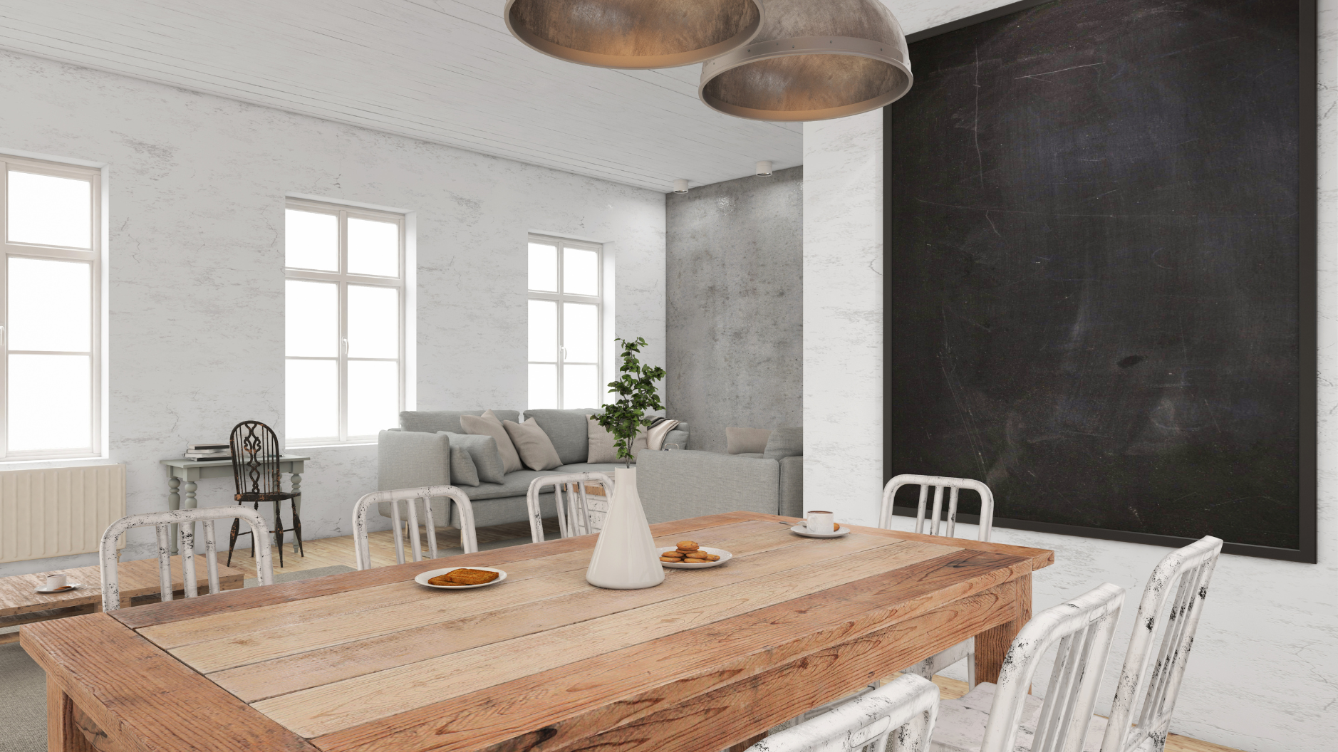 A dining room with a wooden table and chairs and a blackboard on the wall.