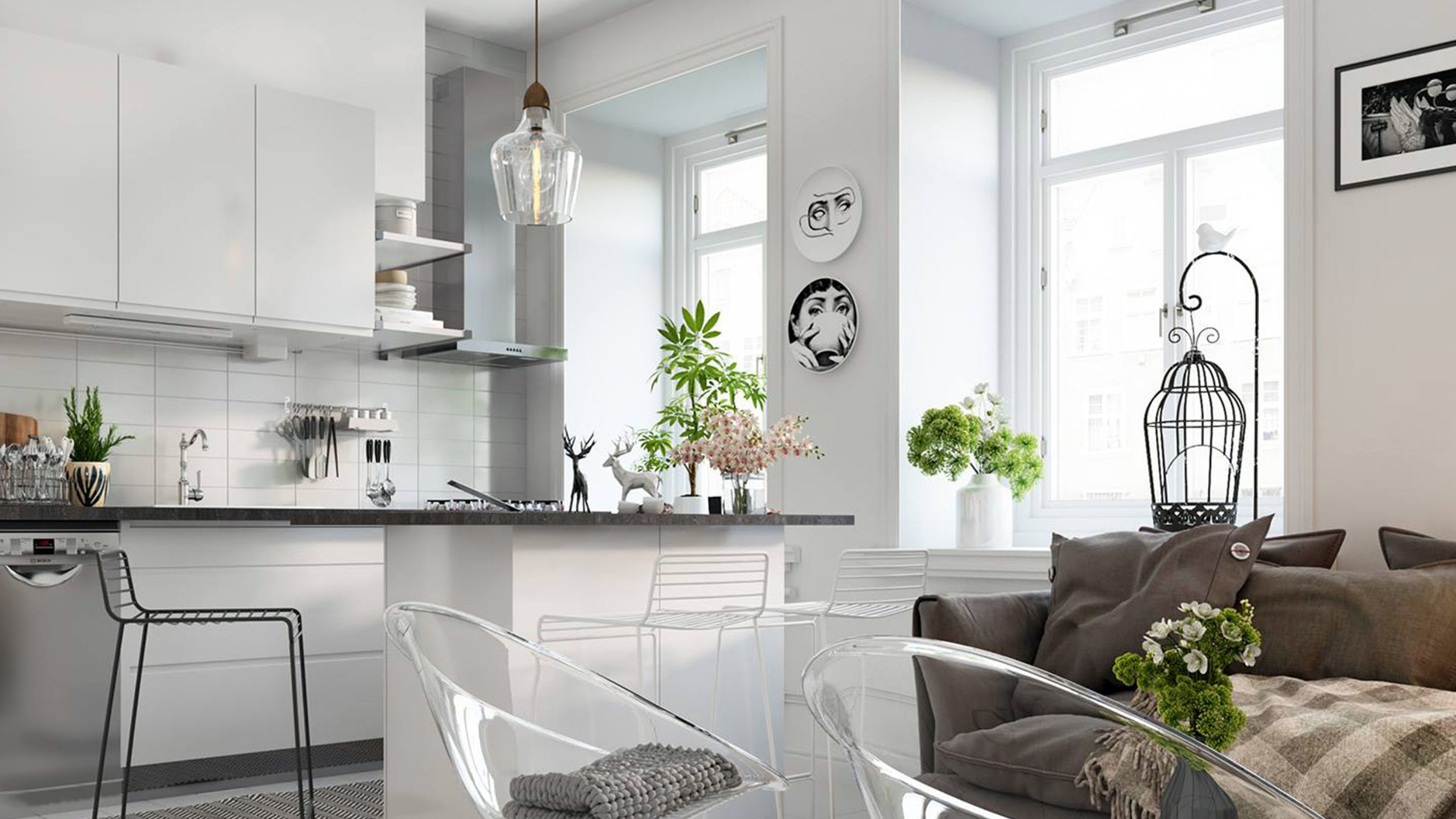 A living room with a couch , table , chairs and a kitchen.
