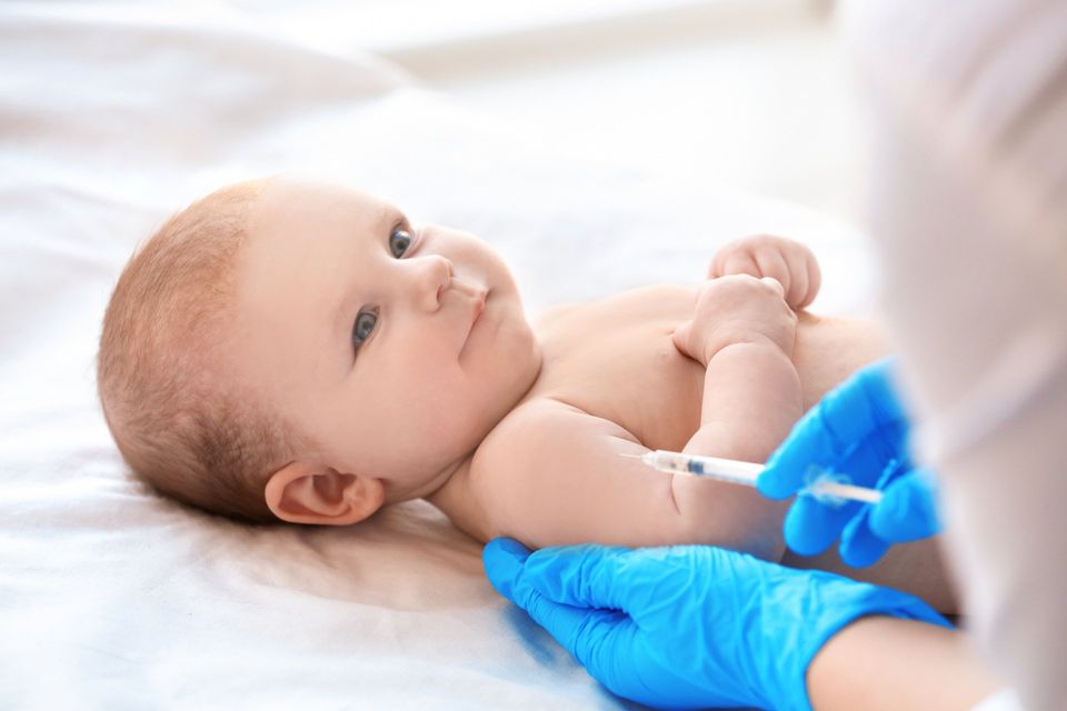 newborn infant vaccine needle shot