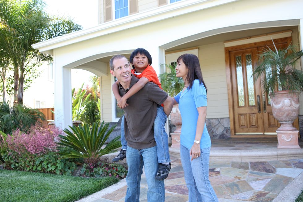 Happy family after our termite control measures in Honolulu, HI