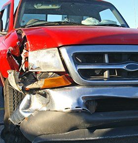 Damaged Red Car — Little Rock, AR — Dabbs & Pomtree Attorneys at Law