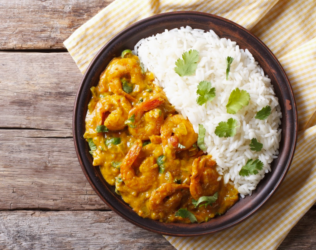Mild Curry Prawns with Steamed Rice and Seasonal Vegetables 
