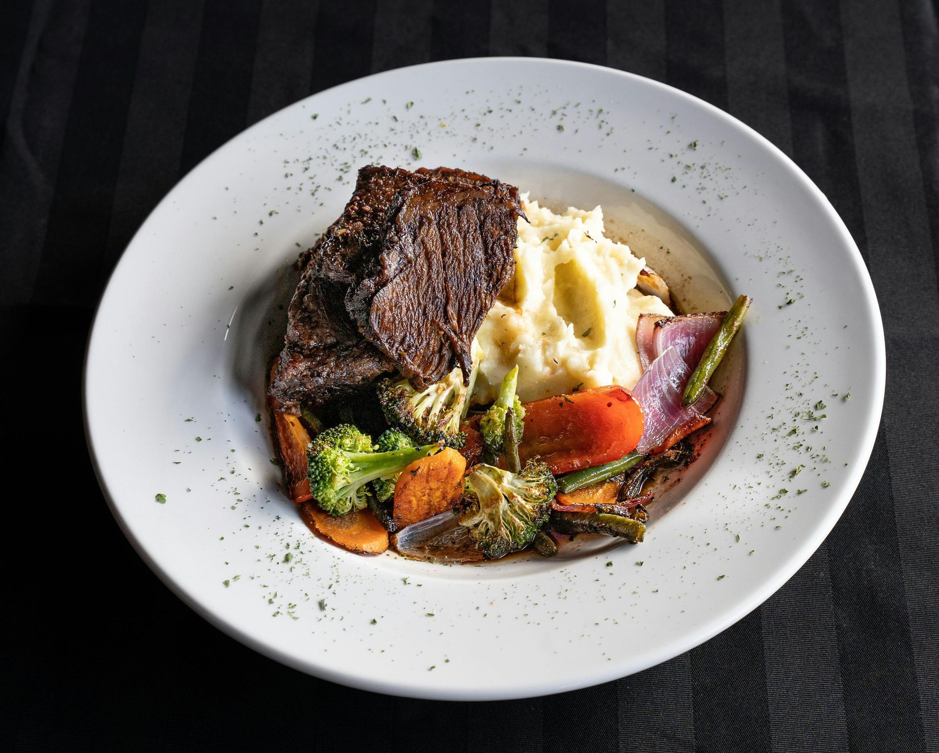 Corned Beef with Mash Potato, Seasonal Vegetables and White Sauce