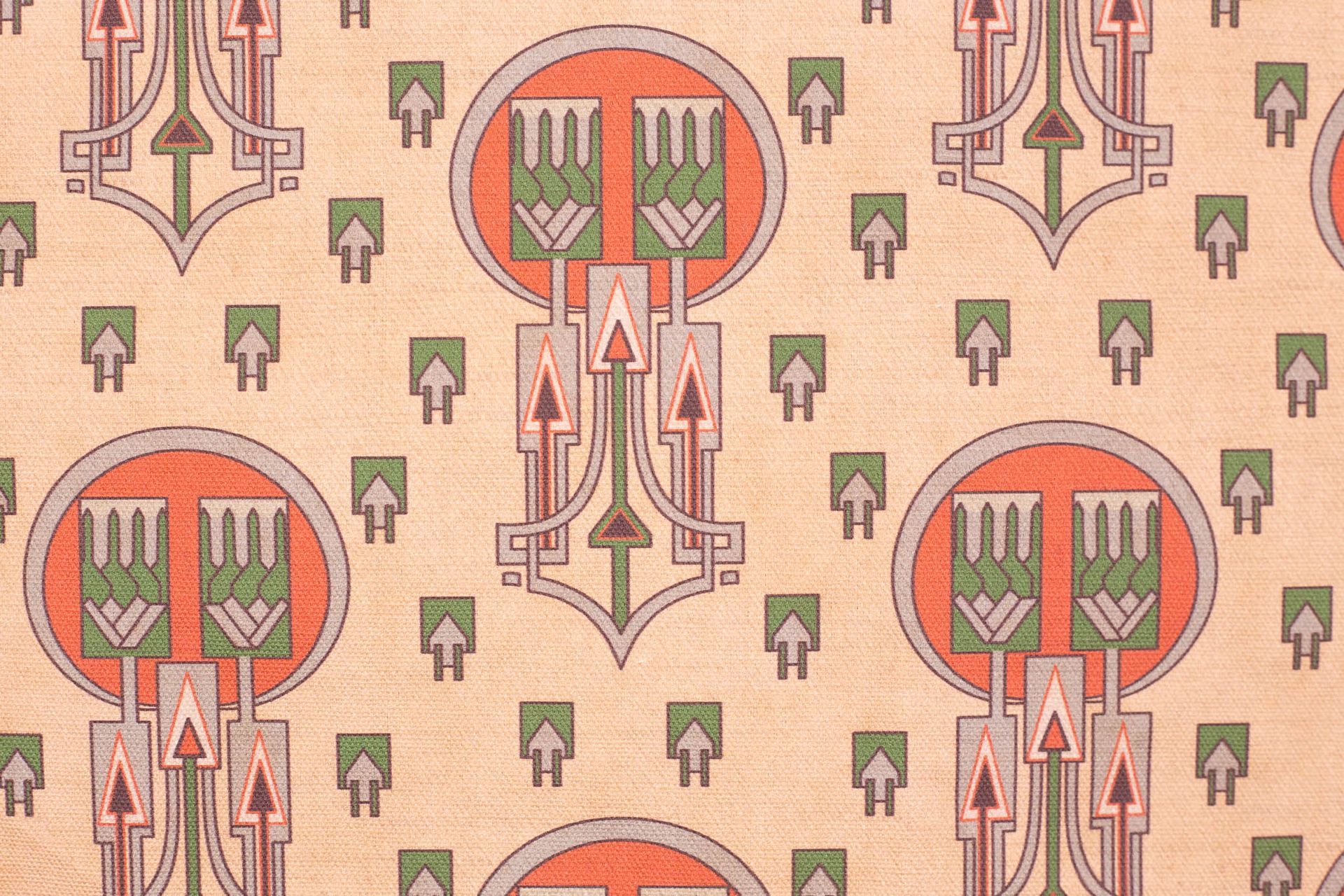 A close up of a curtain with arrows on it