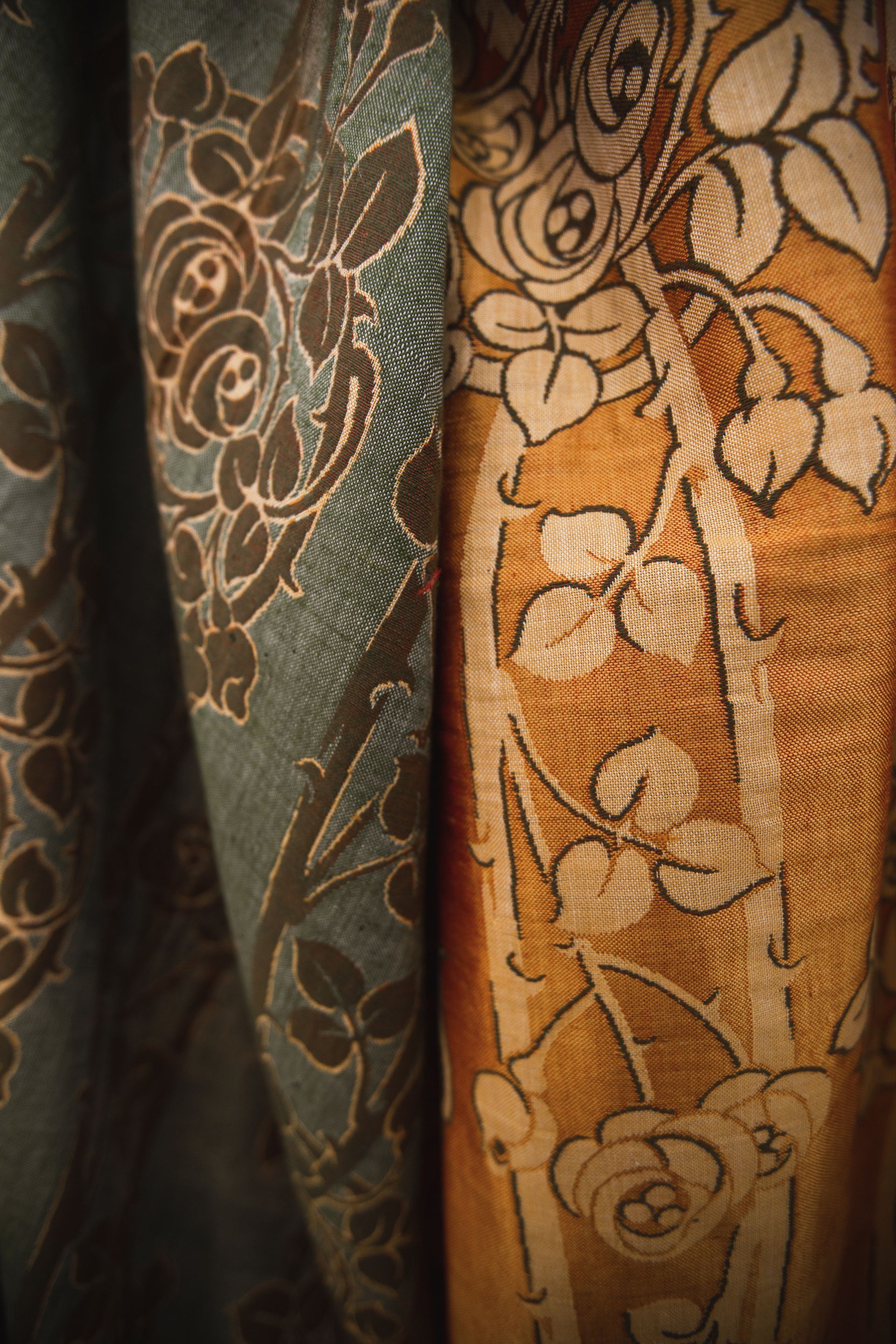 A close up of a piece of fabric with flowers on it