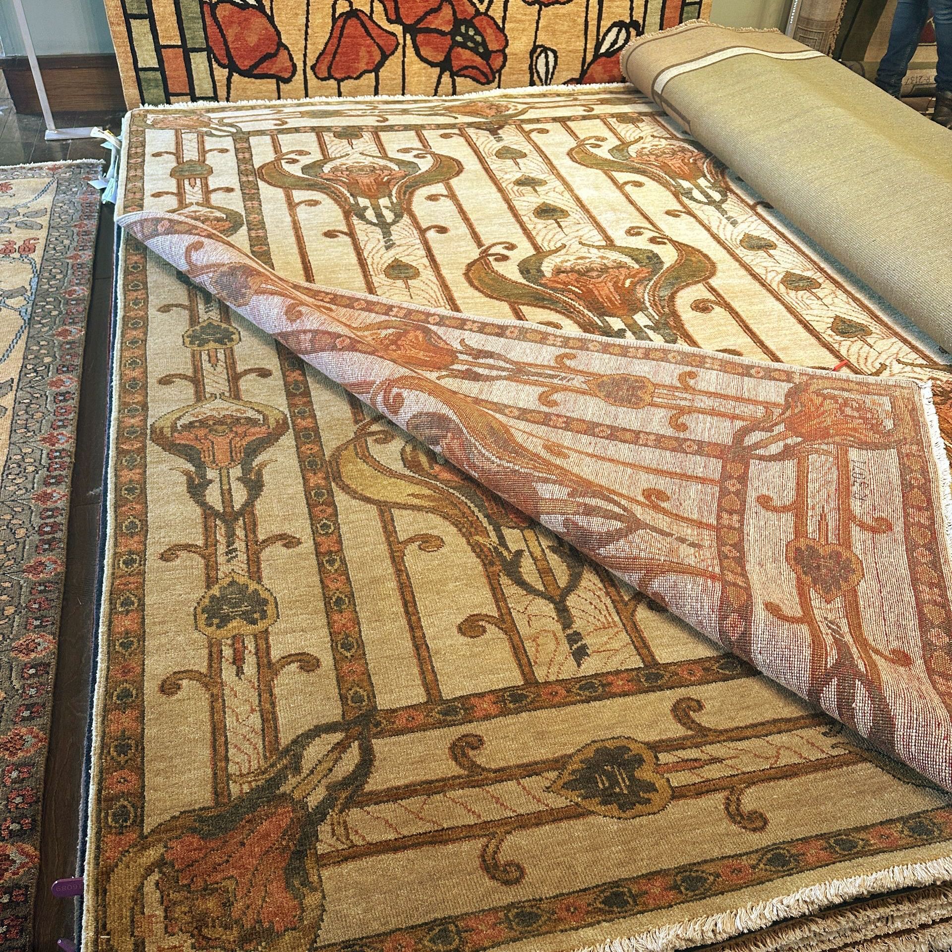 A rug with a deer on it is sitting on top of a table.