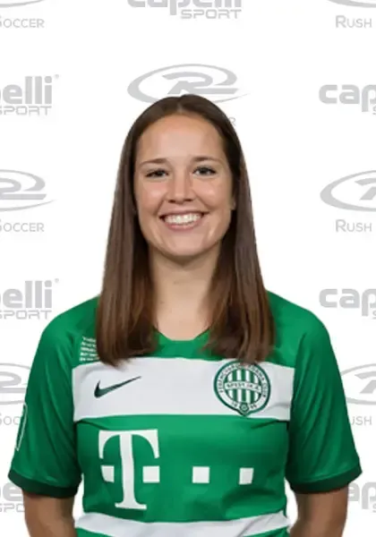 A woman wearing a green t-mobile jersey smiles for the camera