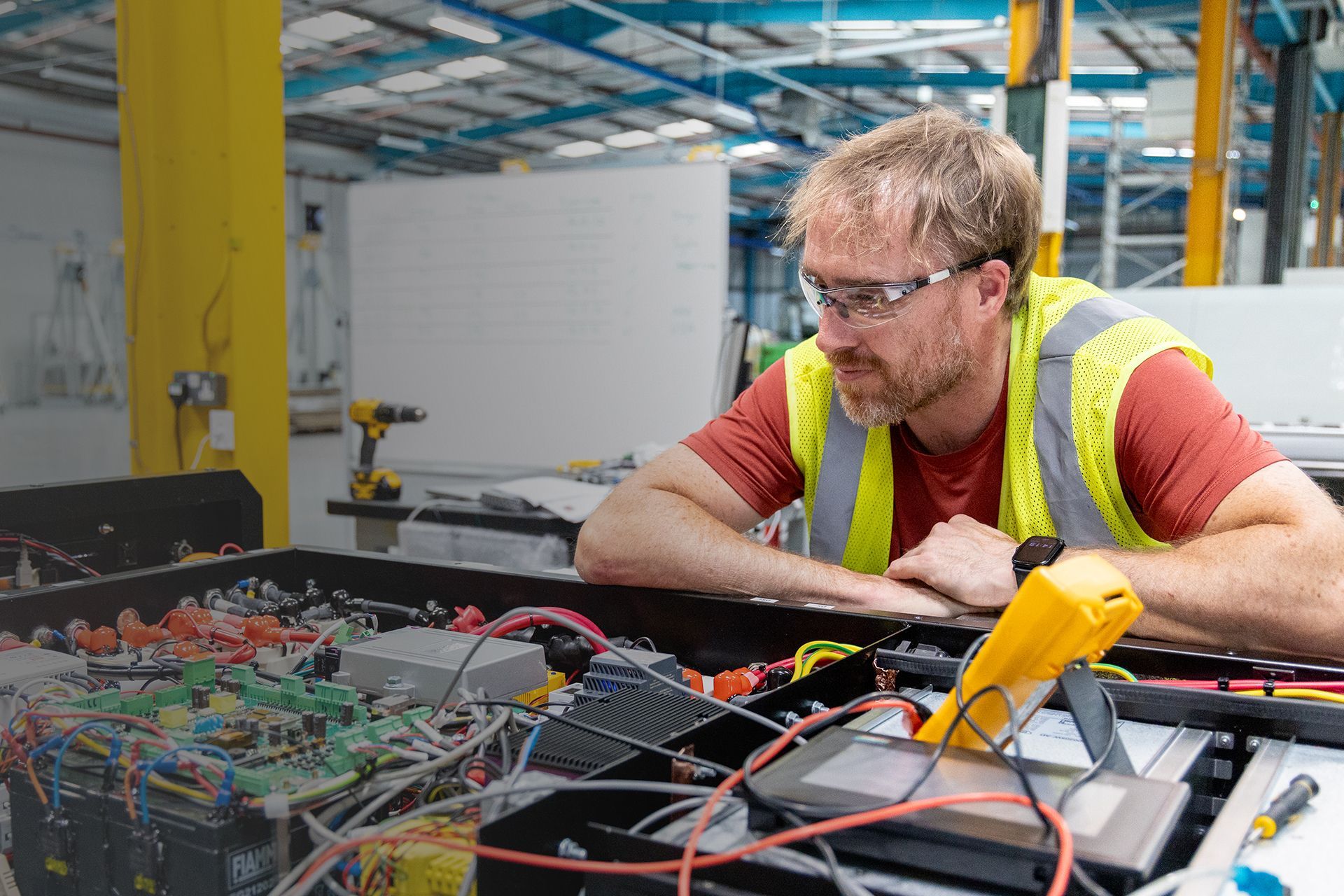 Mechanic inspecting electronics