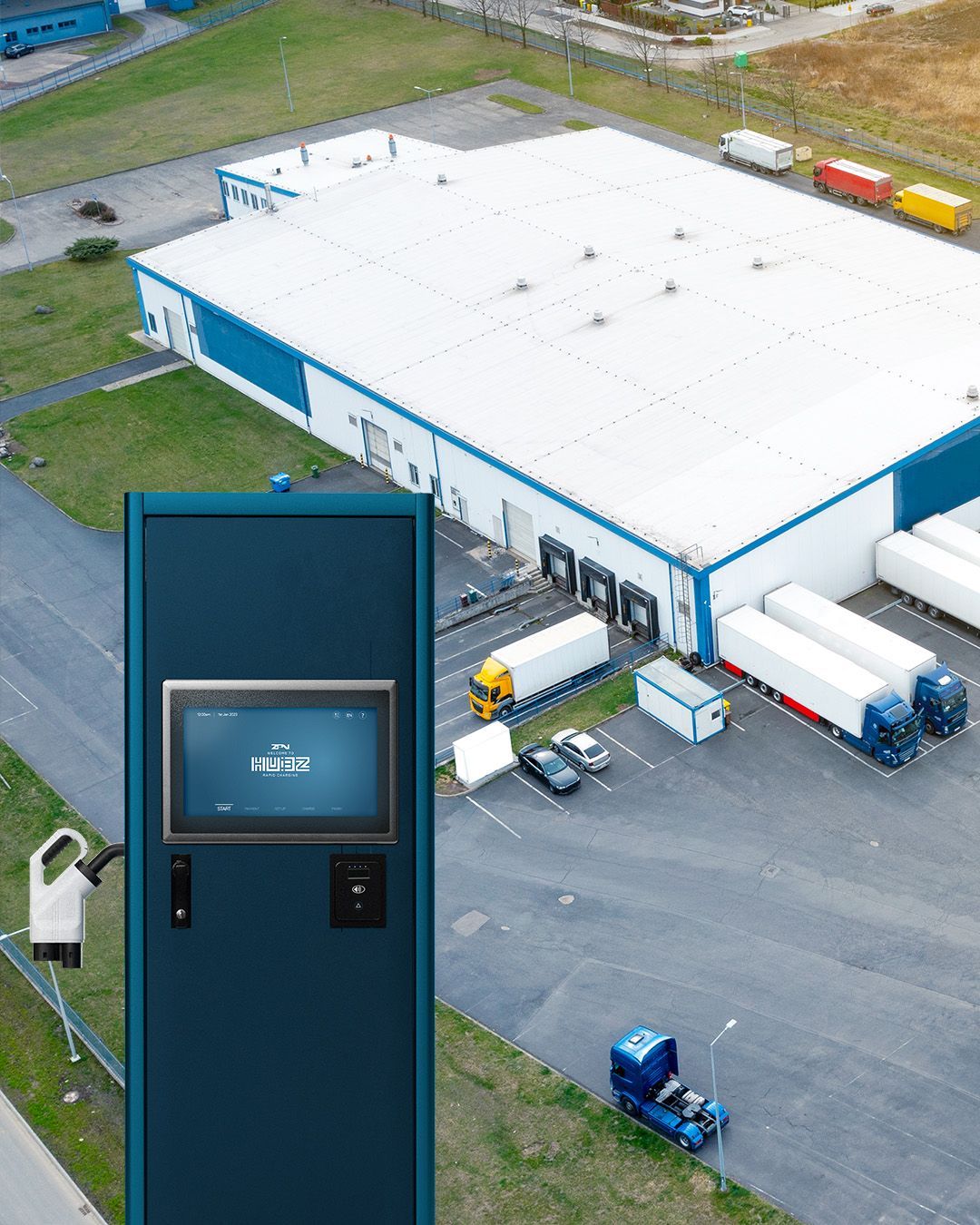 A HUBZ rapid EV charger in front of a birds eye view of a fleet depot  with lorries and trucks parked up