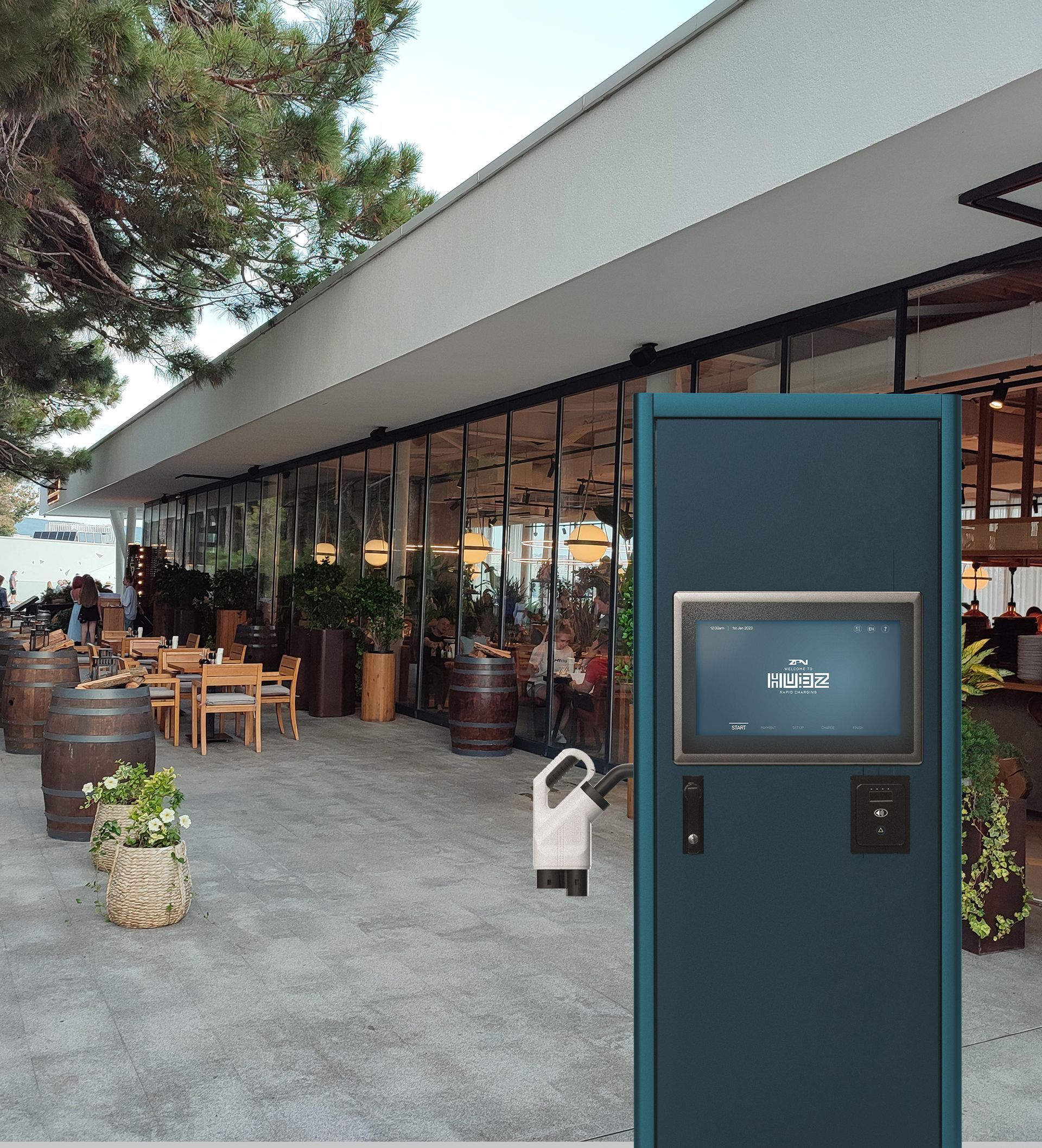 A HUBZ charger and Battery storage container in front of the entrance to a modern restaurant 