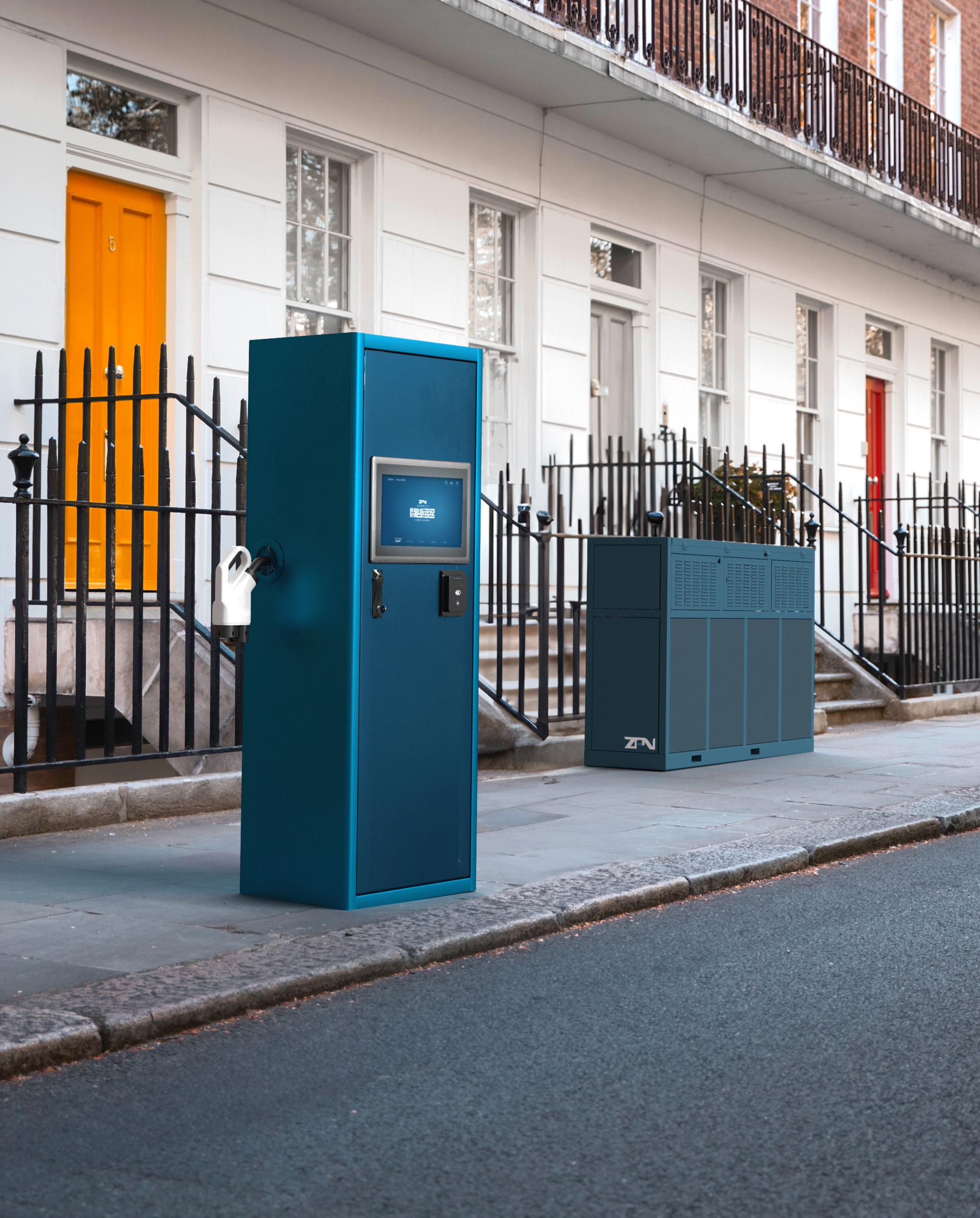 A HUBZ charger and Battery storage container on a London street in Britain in front of a series of townhouses.