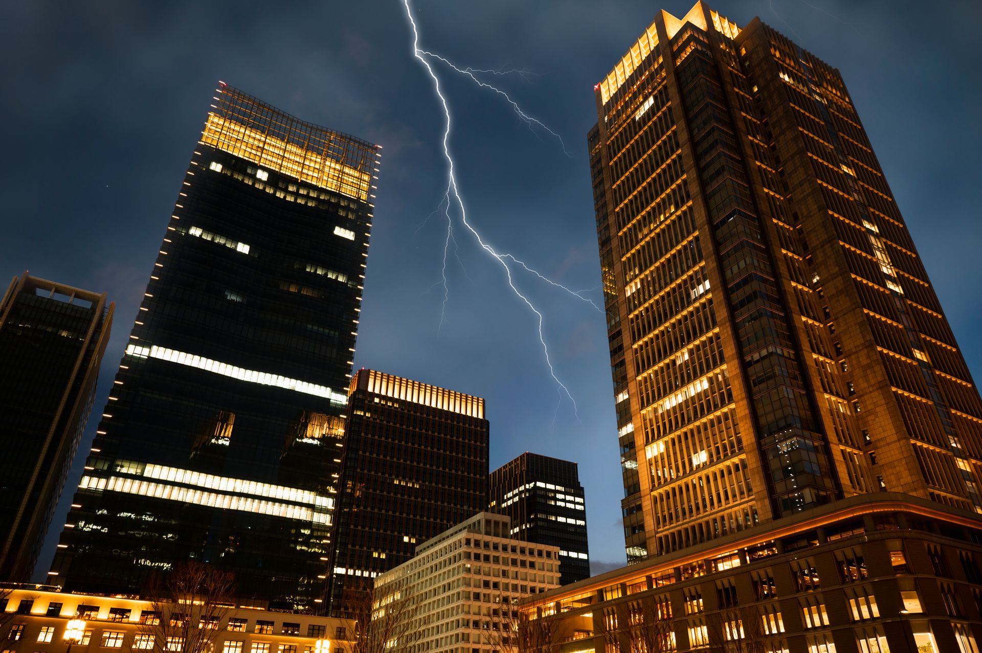 A Lightning strike between two tall buildings