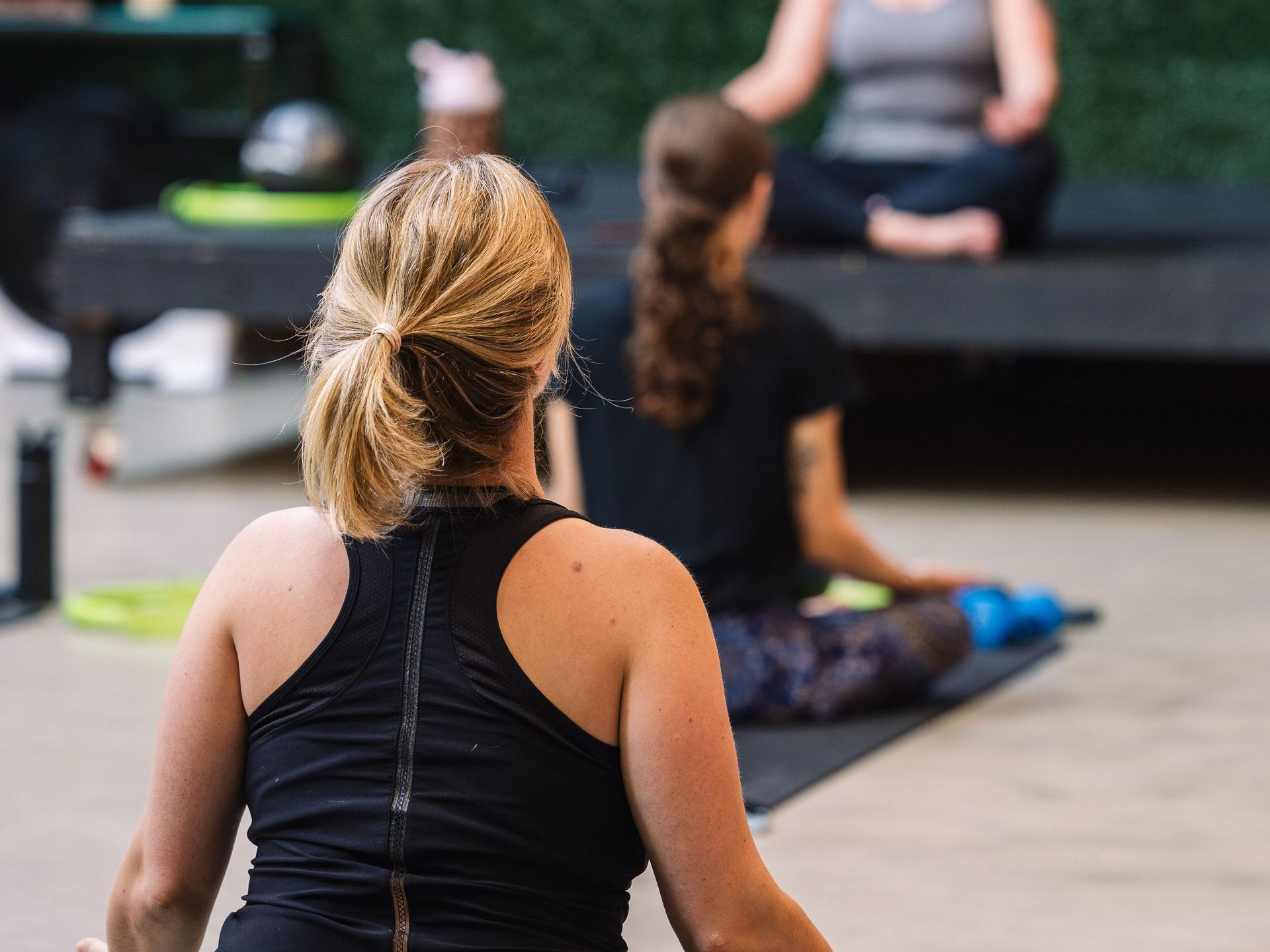 Students sitting during a yoga class