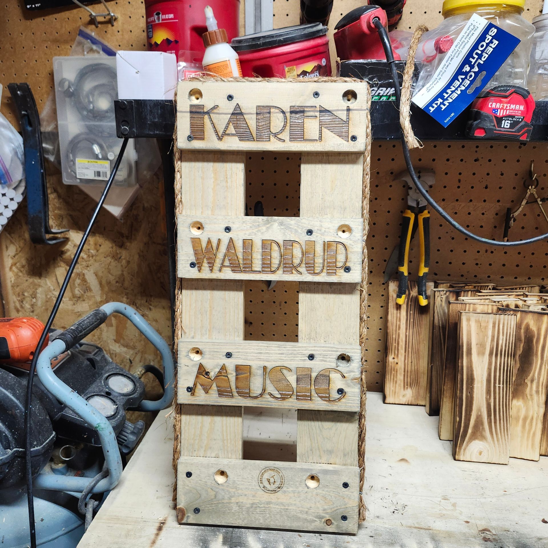 Wooden sign made from pallet, labeled 