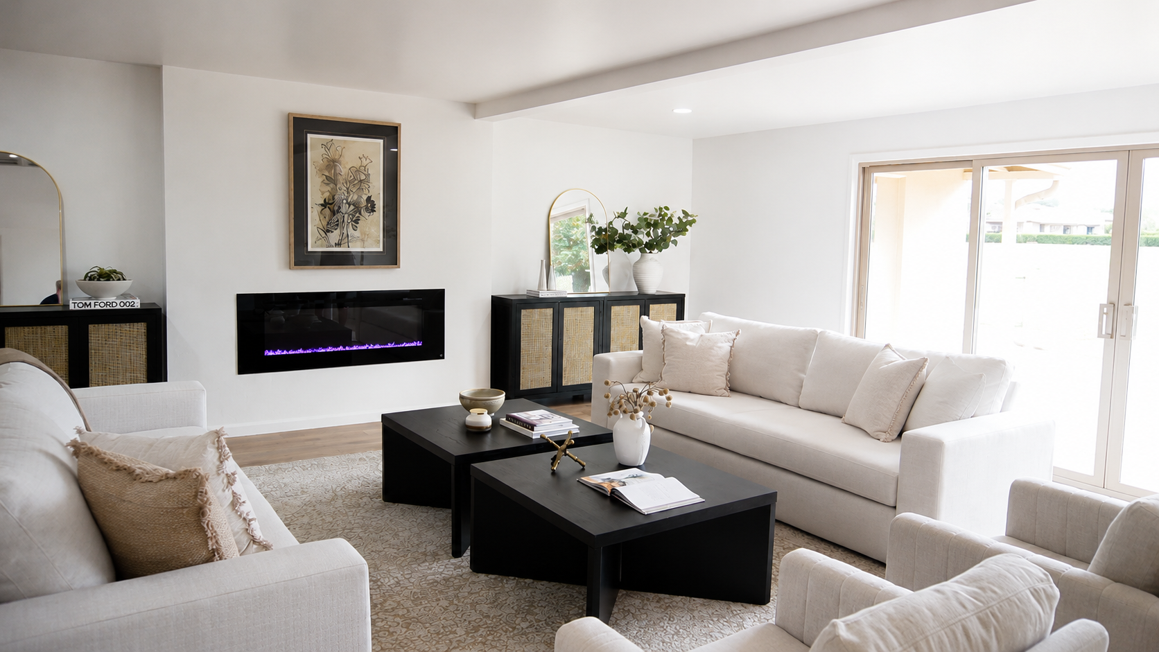 Modern living room with an electric fireplace in a remodeled townhouse in Casas del Oro, Tucson AZ