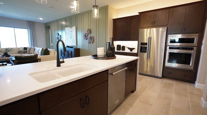 Gourmet kitchen with a 10-foot island - Hibiscus by Mattamy Homes at Tavira, Twin Peaks, Marana AZ