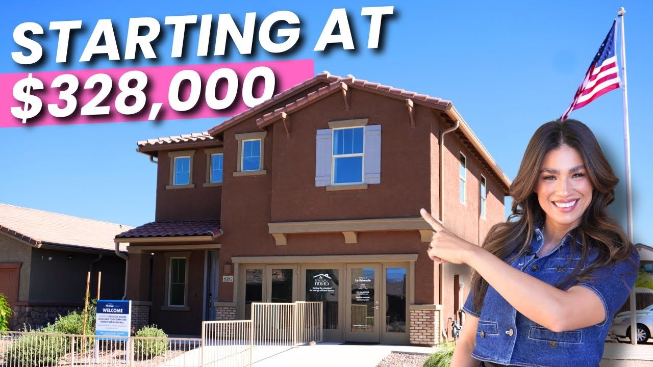 A woman is pointing at a house that is starting at $ 328,000