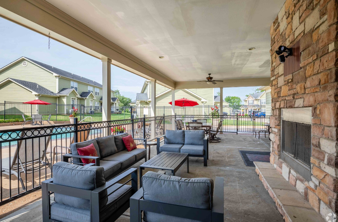 There is a fireplace in the middle of the room.