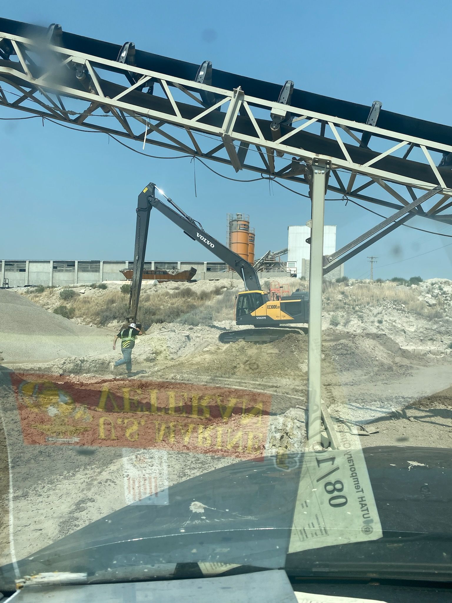 A view of a construction site from a car window