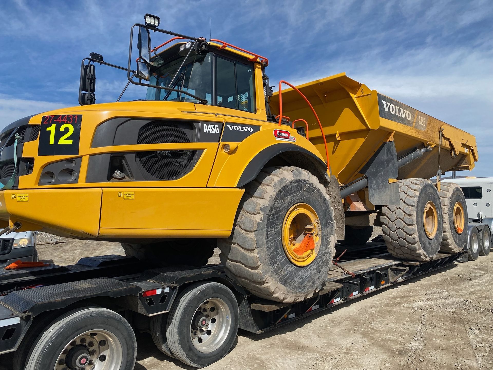  Hurricane Marine Construction mining company equipment convoy on site.