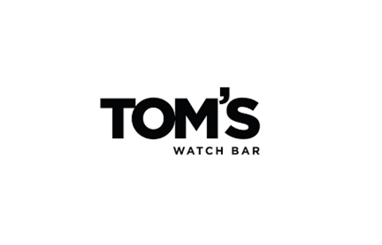 The logo for tom 's watch bar is black and white on a white background.