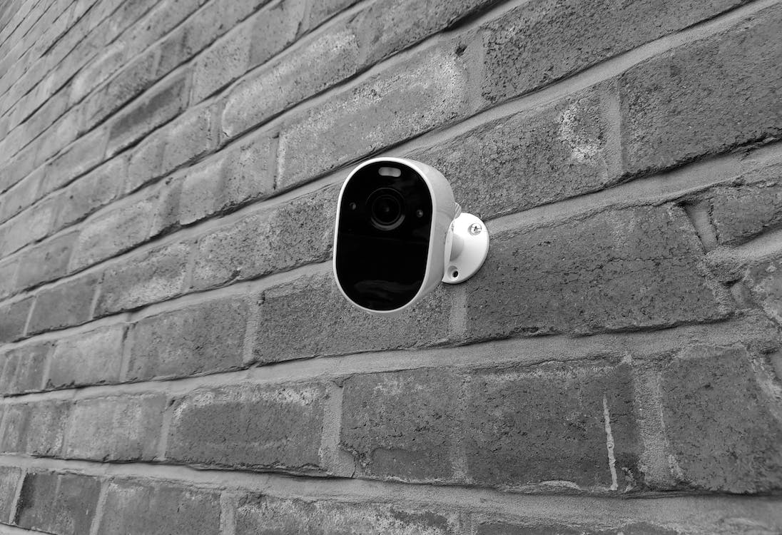 Professional security camera installation on a wall
