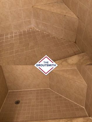 A picture of a shower with a grout smith logo on it.