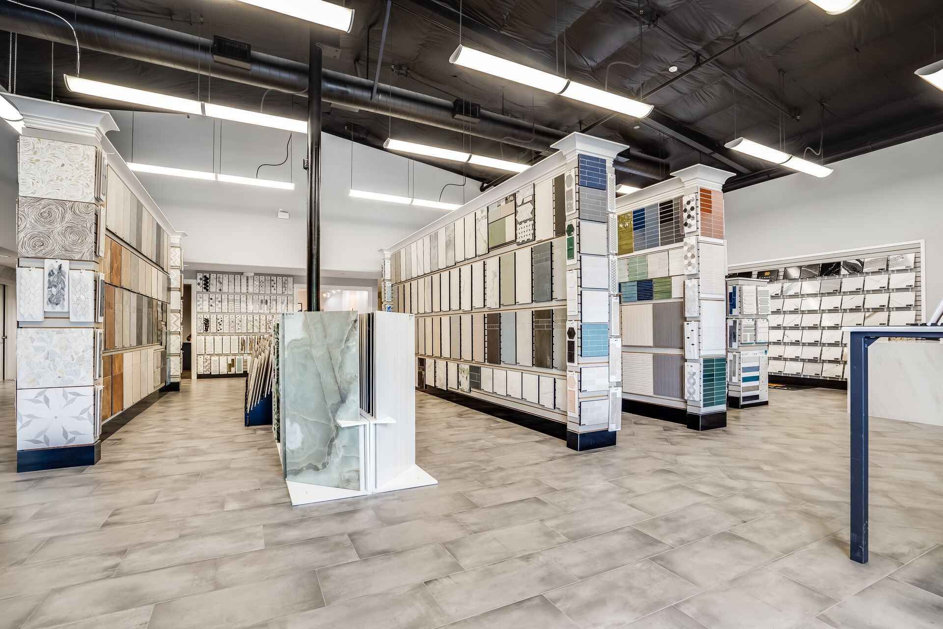 There are many different types of tiles on display in this store.