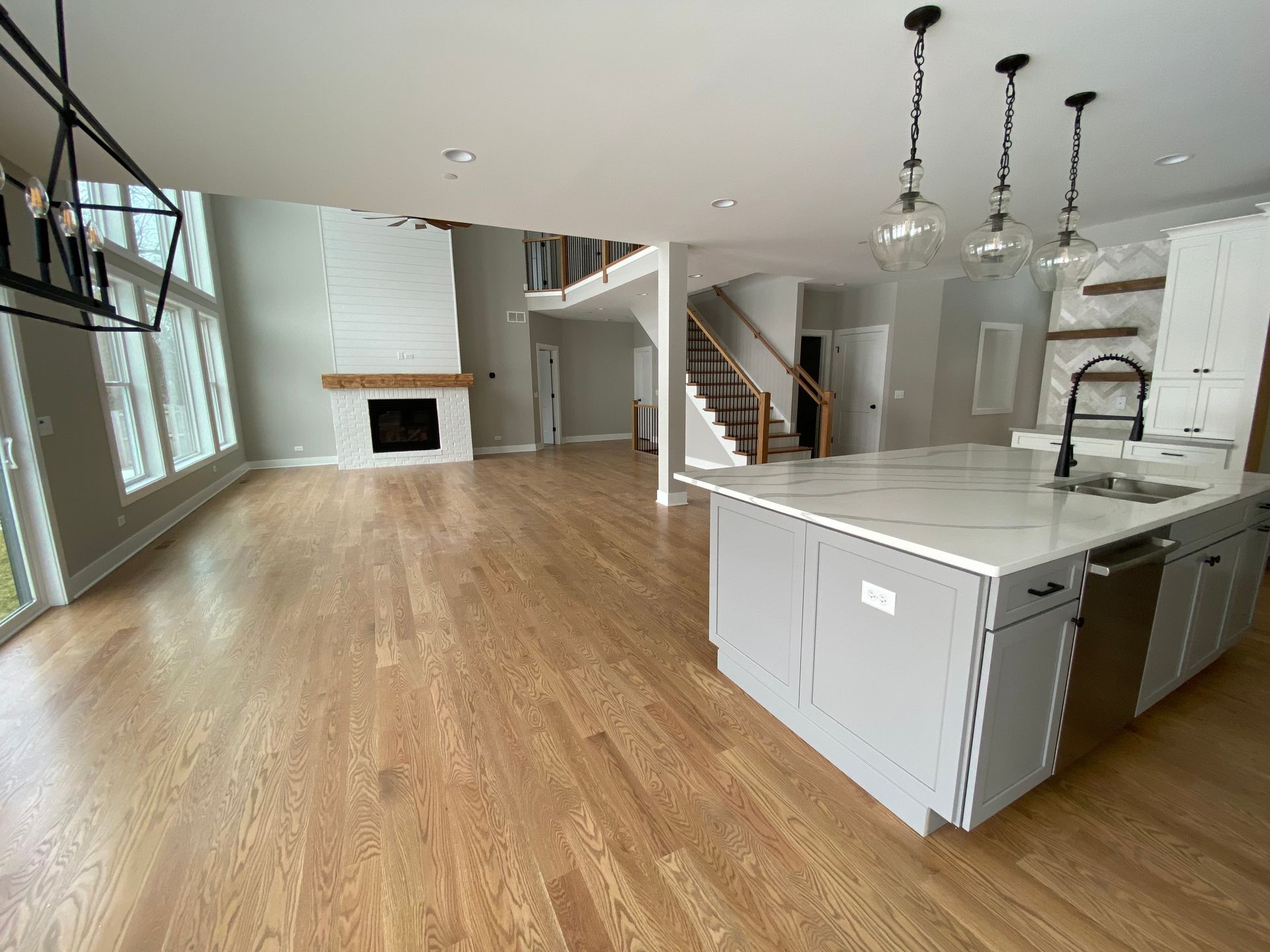 There is a large island in the middle of the kitchen.