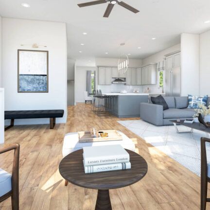 A living room with a couch and a table with books on it