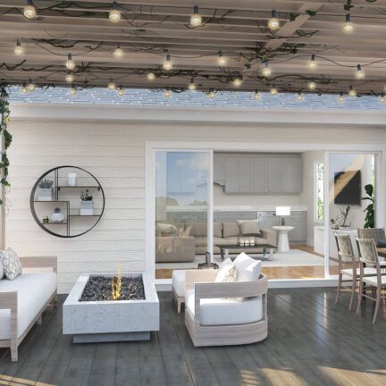 A living room with a couch , chairs , and a fire pit.