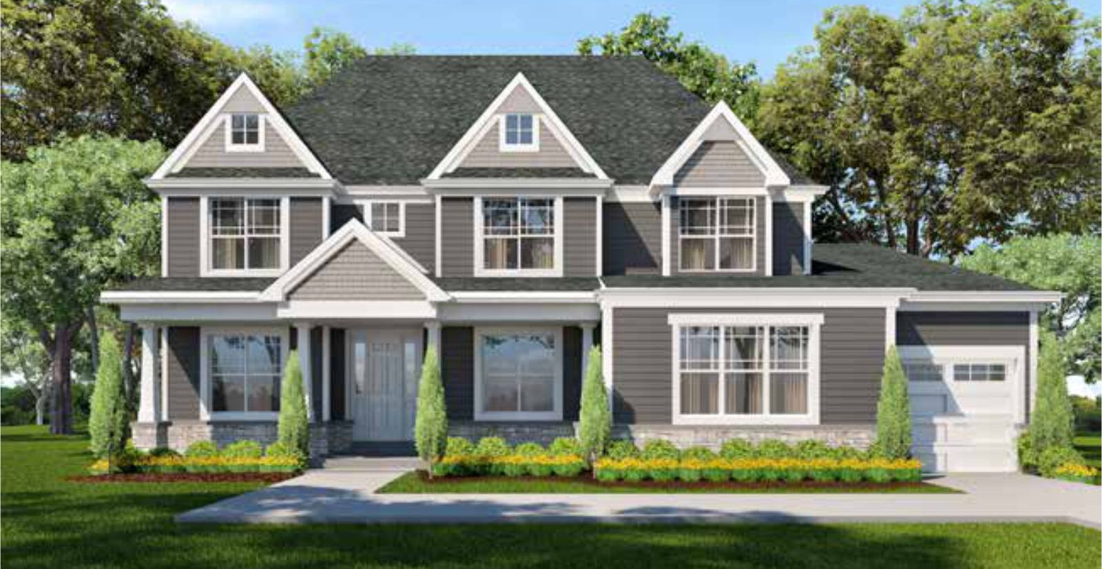 A large house with a lot of windows and a black roof.