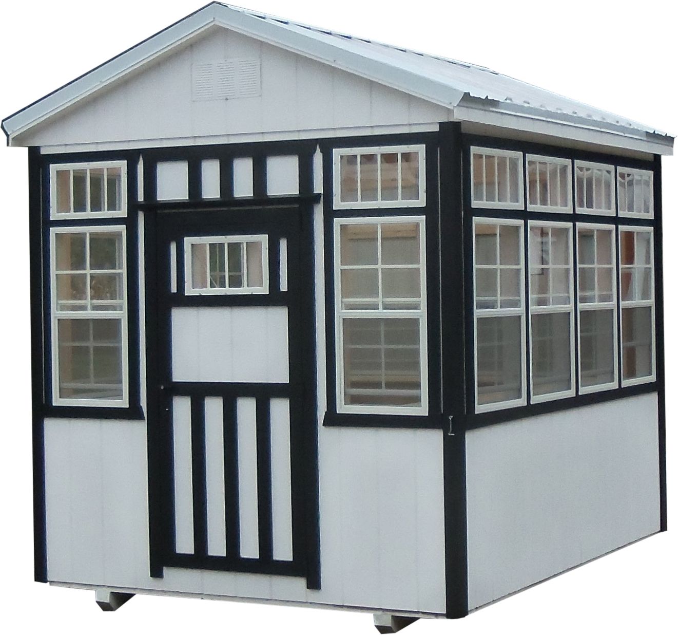 Small black-and-white kiosk or booth with many windows and a peaked roof on wheels