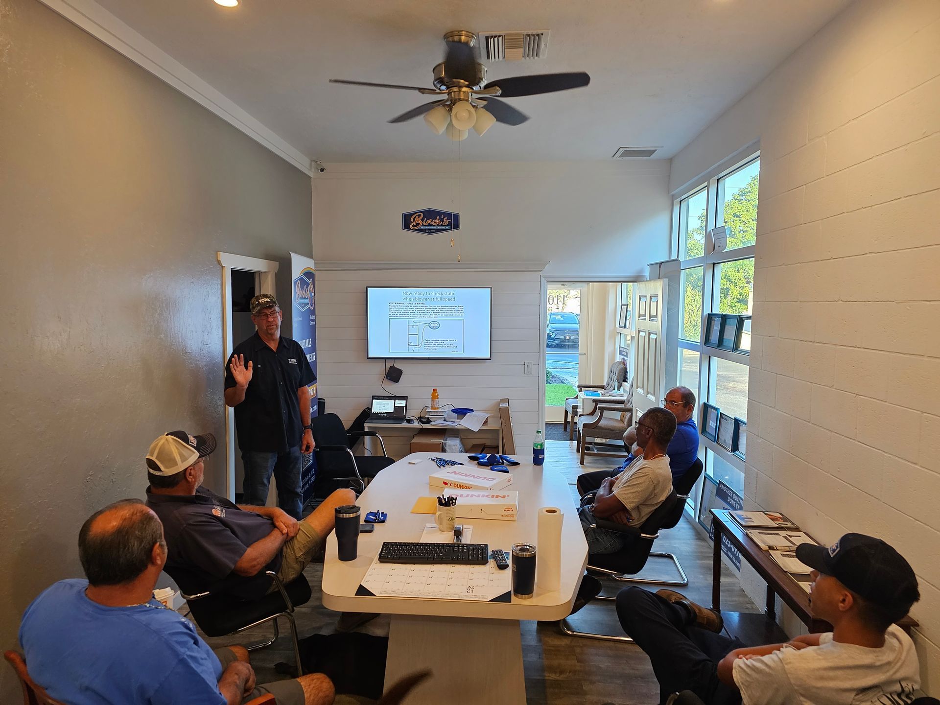 Small meeting going over the benefits of installing the new wifi Thermostats in SWFL.