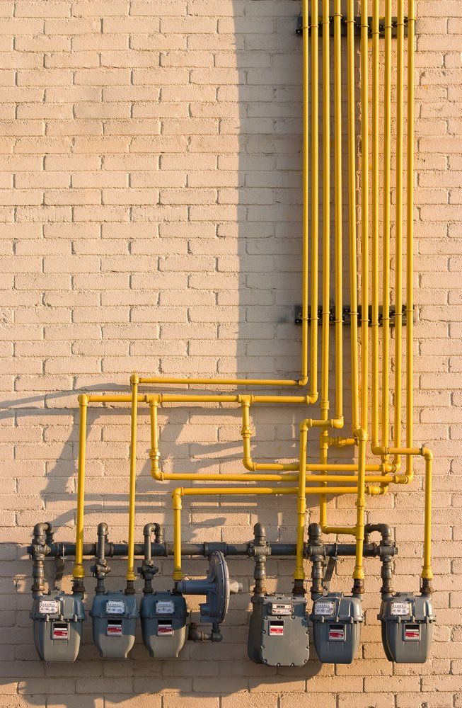 Maze of Pipes and Natural Gas Meters — Plumbing in Pottsville, NSW