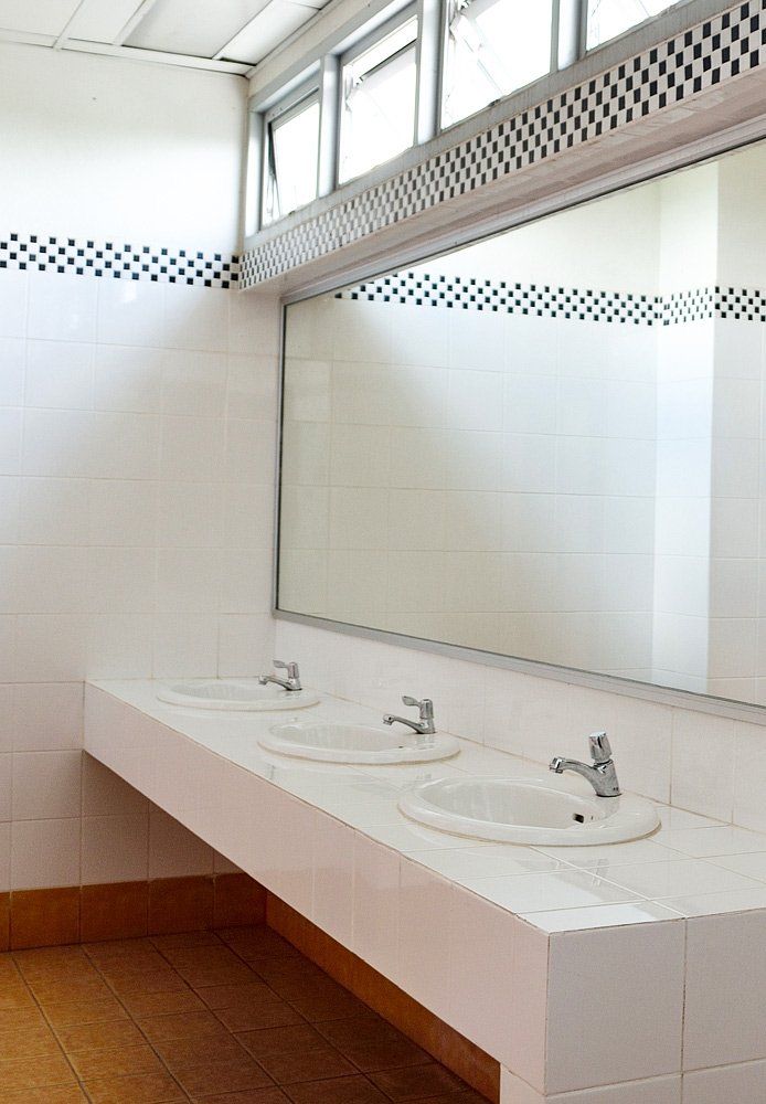 Handbasin and Mirror in Toilet — Plumbing in Cabarita Beach, NSW