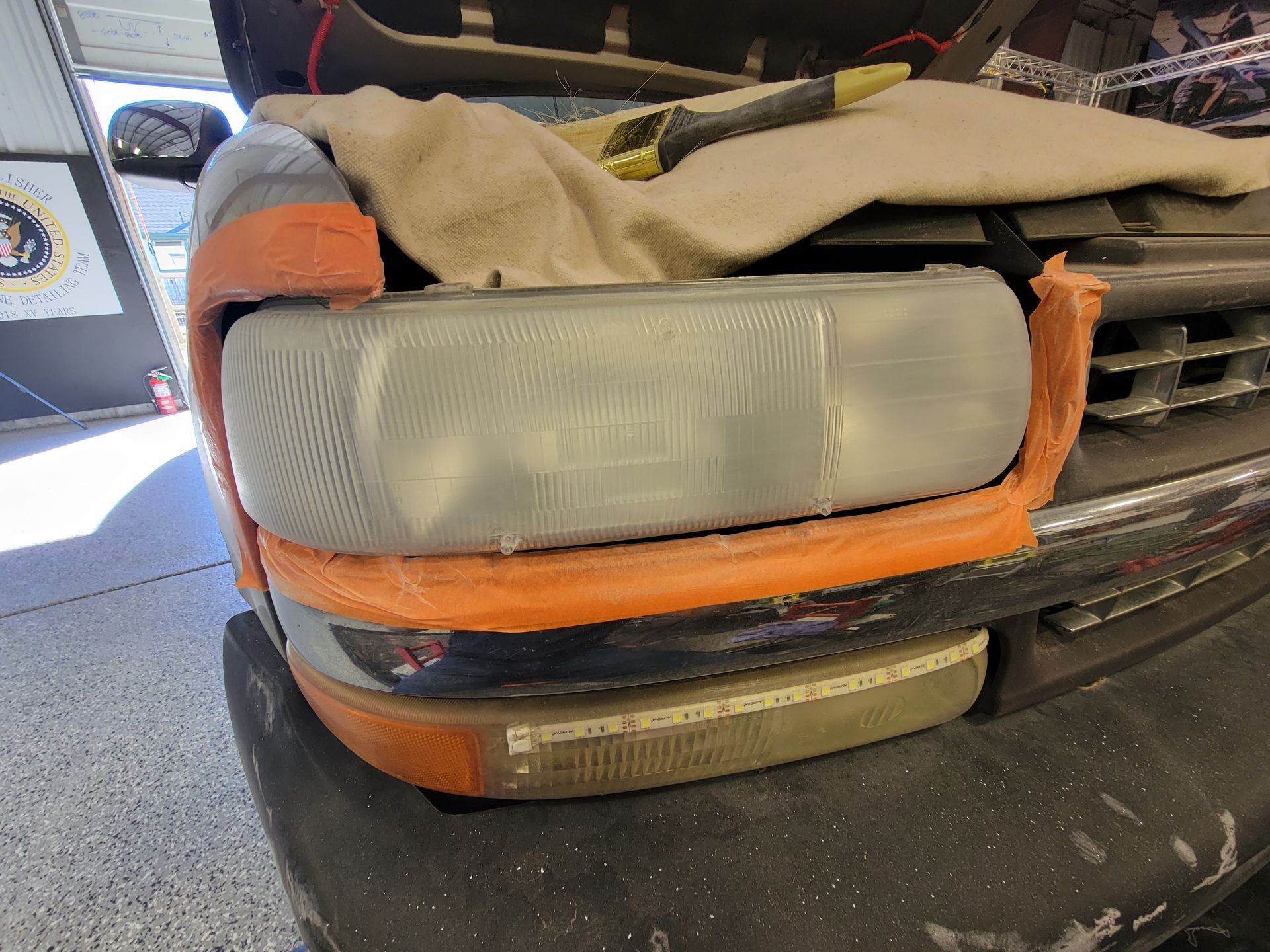 Before Headlight Restoration Chevy 1500 In Albuquerque, NM
