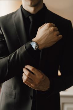 businessmen wearing a luxury watch