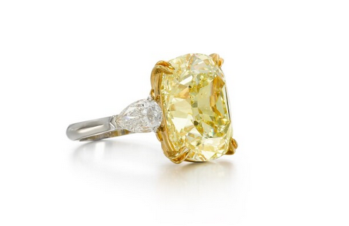 Fancy Intense Yellow diamond and diamond ring 
