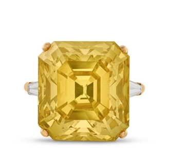 TREATED COLOURED DIAMOND AND DIAMOND RING, MOUNTED BY CARTIER