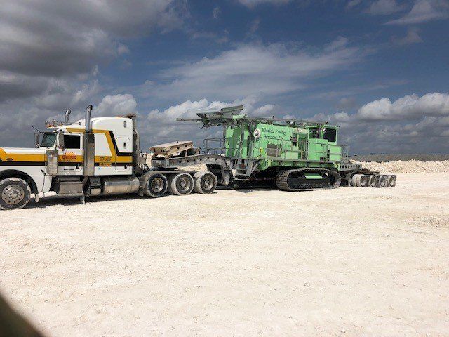 Green Old Truck on Site — Opa-locka, FL — Sunshine Heavy Hauling, Inc.