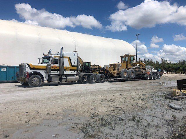 White Old Truck on Site — Opa-locka, FL — Sunshine Heavy Hauling, Inc.
