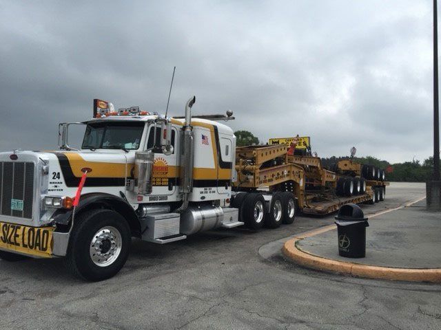 Yellow Truck — Opa-locka, FL — Sunshine Heavy Hauling, Inc.