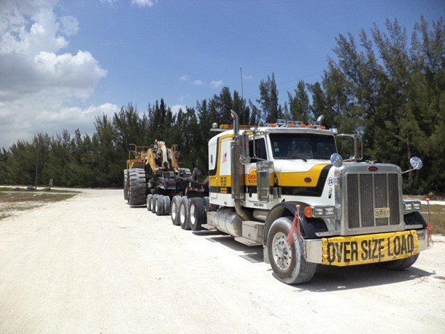 Yellow Truck — Opa-locka, FL — Sunshine Heavy Hauling, Inc.